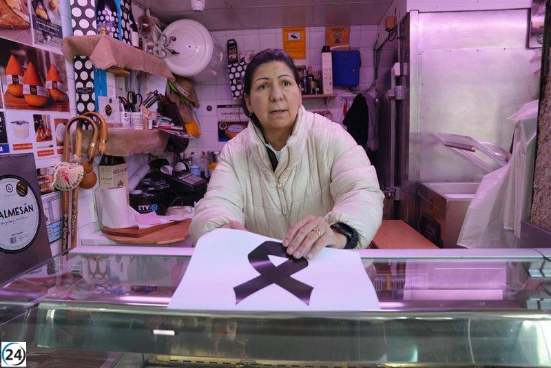 Dos arrestados por el homicidio de un carnicero en el mercado de Santiago.